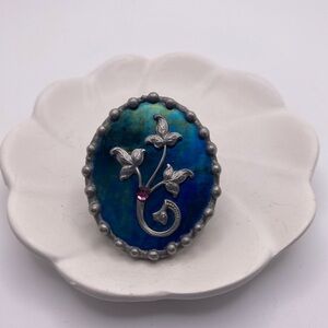 Art Nouveau Pewter Brooch with Blue Green Iridescent Background Floral Scroll